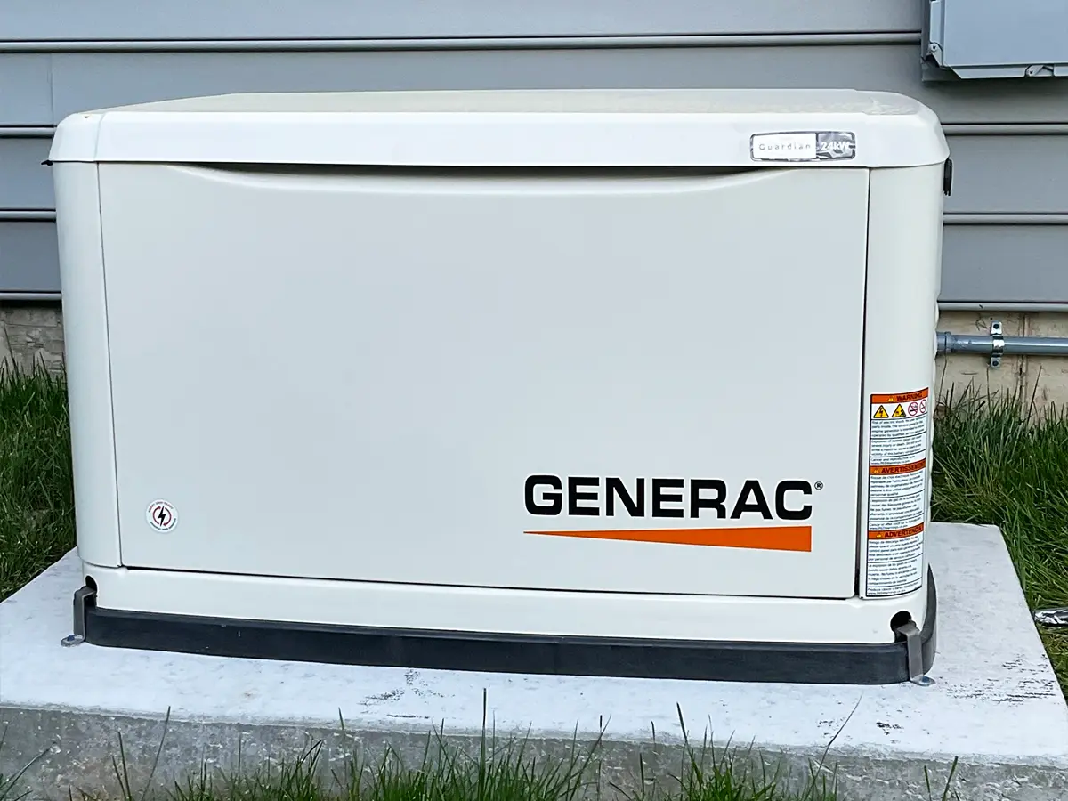 Generac Guardian series generator installed on concrete base for home power backup