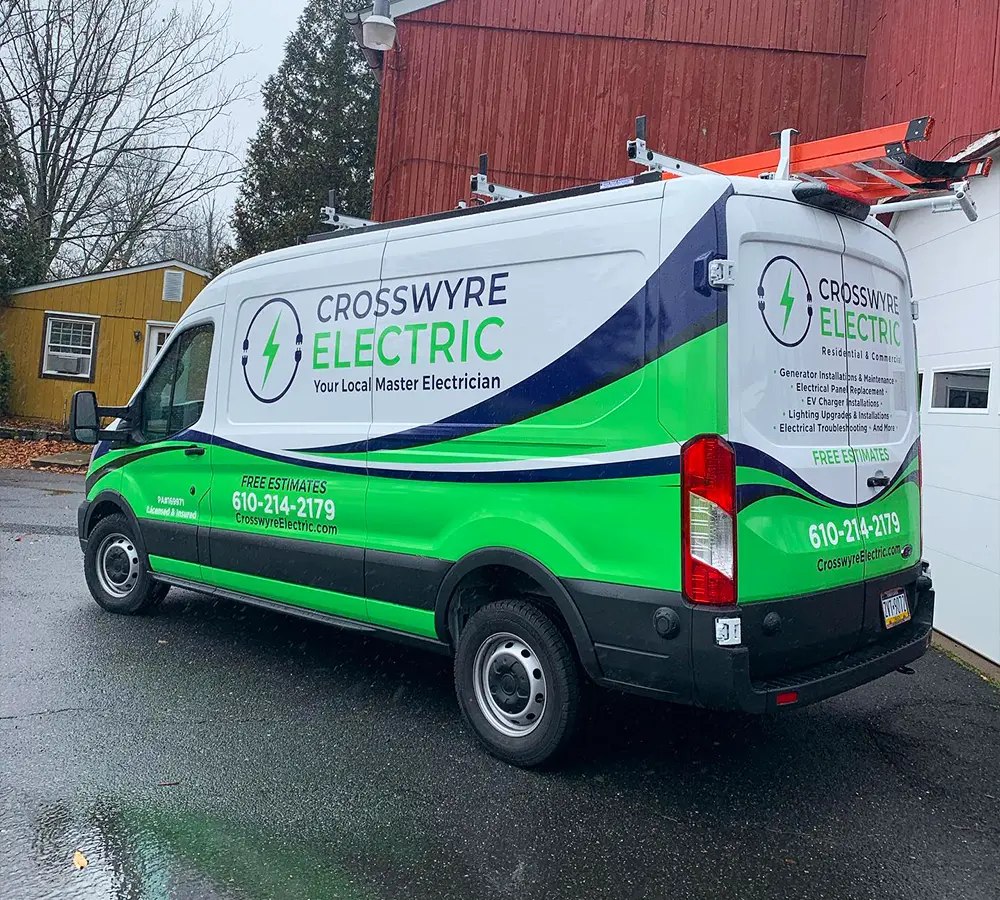 Crosswyre Electric company service van, branded with logo and contact information for electrical services.