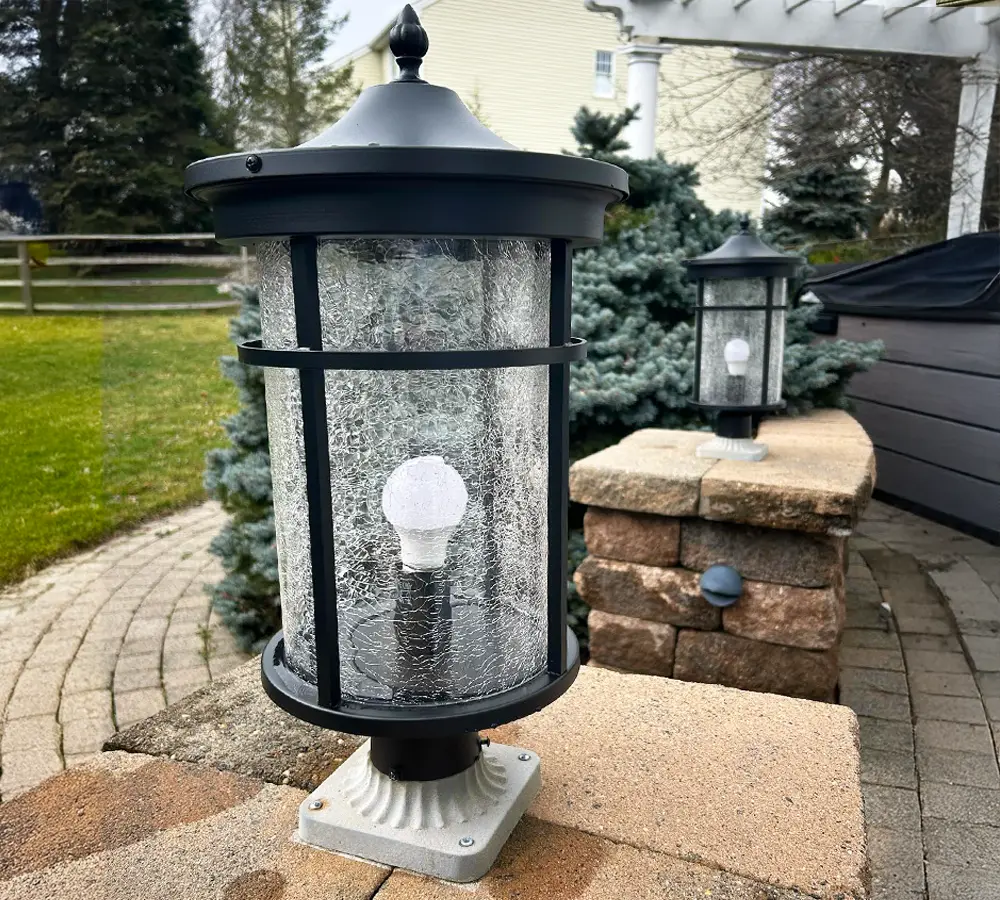 Outdoor patio with decorative lighting fixtures creating a welcoming atmosphere for evening gatherings.